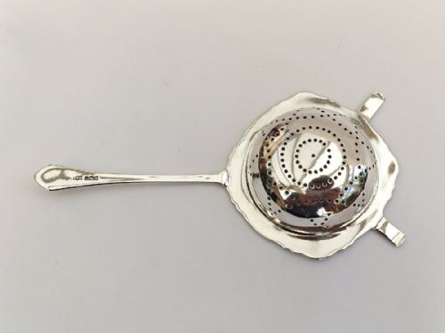 fig 1. A gorgeous George V silver tea strainer.