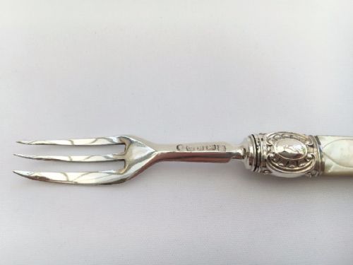 fig 1. An early Victorian silver and mother-of-pearl pickle fork.