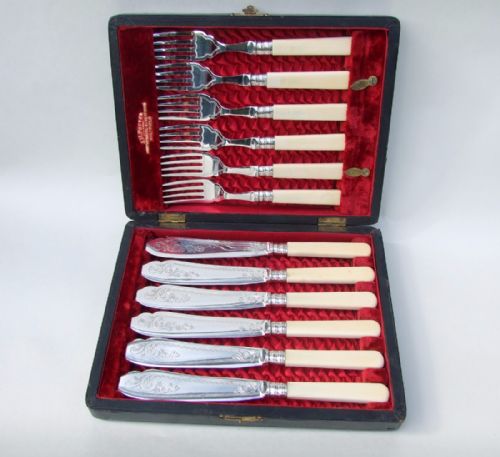 fig 1. A fine set of Edwardian silver plated fish knives and forks.
