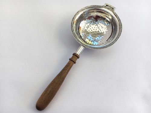 A Gorgeous Silver Tea Strainer.