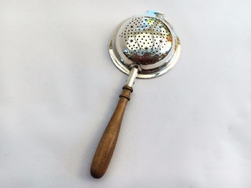 fig 1. A gorgeous silver tea strainer.