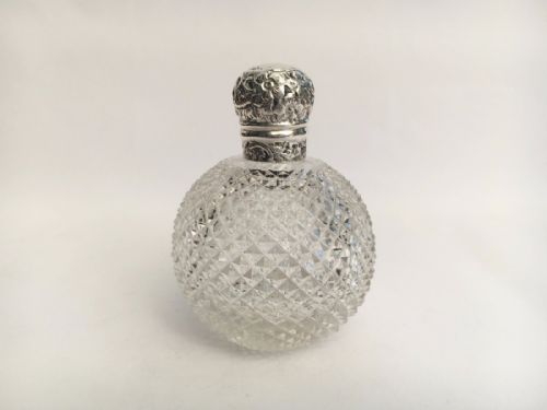 A Gorgeous Silver Mounted Victorian Cologne Bottle.