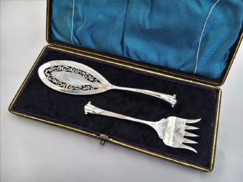 A Wonderful Boxed Pair of Silver Onslow Pattern Sardine Servers.