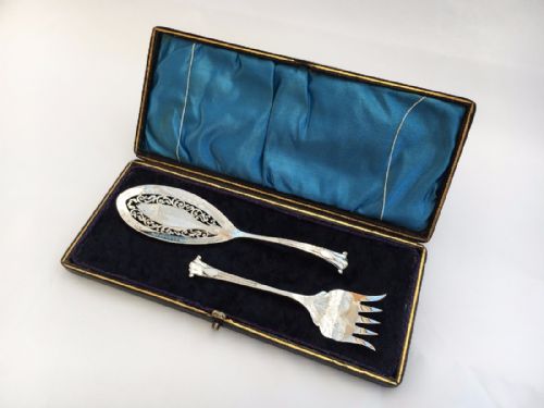 fig 1. A wonderful boxed pair of silver Onslow pattern sardine servers.