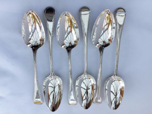 fig 1. A set of six George III bead pattern dessert spoons.