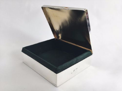fig 1. A handsome silver Edwardian green satin lined box.