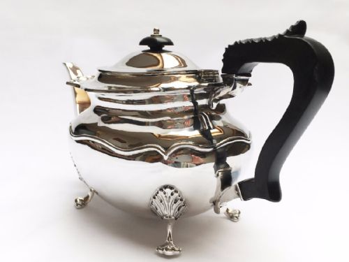 fig 1. A fine quality silver breakfast teapot.