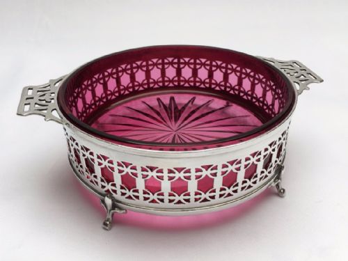 A Gorgeous Pierced Silver Dish with Cranberry Glass Liner.
