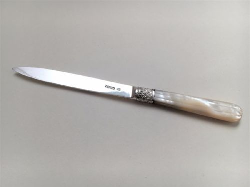 A Silver and Mother-of-pearl Georgian Letter Opener.