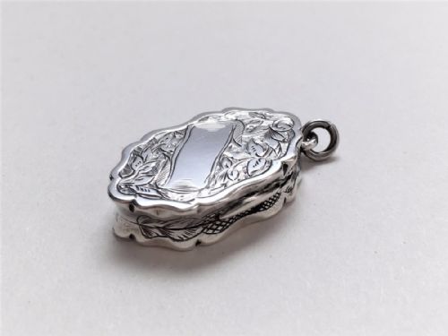 An Exquisite Miniature Victorian Silver Vinaigrette.