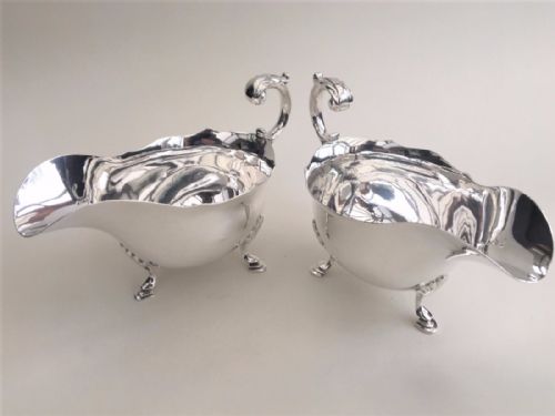 fig 1. An impressive matching pair of silver gravy boats.