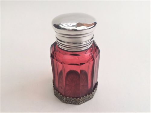 A Large Silver Mounted Victorian Cranberry Scent Bottle.