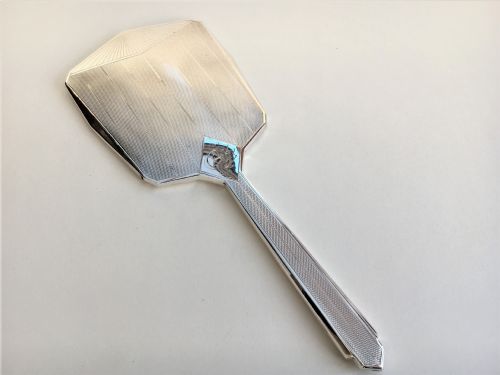 A Stylish Art Deco Hand Mirror from the Chester Assay Office.