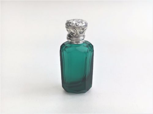 A Charming Victorian Silver Mounted Scent Bottle.