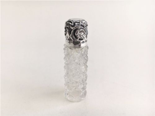 A Victorian Silver Mounted Scent Bottle.