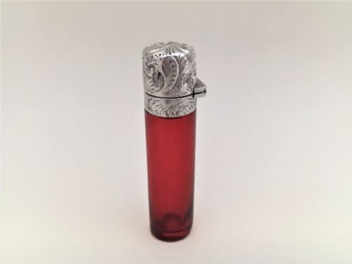 A Victorian Silver Mounted Ruby Scent Bottle.