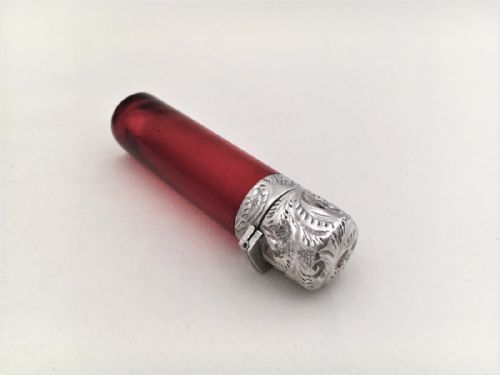 fig 1. A Victorian silver mounted ruby scent bottle.