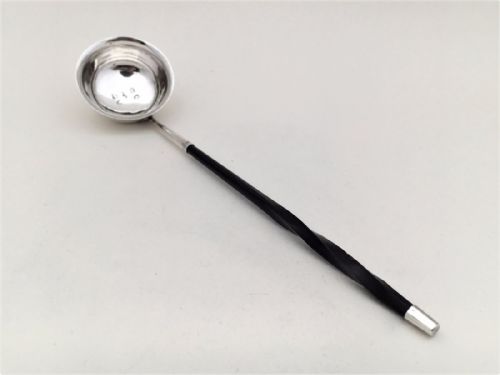 A Georgian Silver Toddy/cream Ladle by Elizabeth Morley.