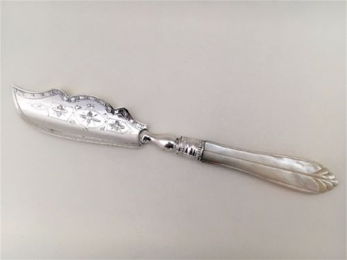 A Charming Victorian Silver and Mother-of-pearl Butter Knife.