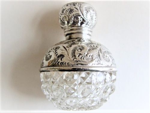 A Splendid Silver Mounted Cologne Bottle.