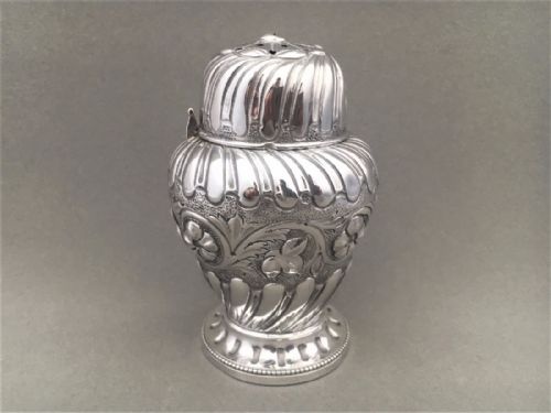fig 1. A fabulous Victorian repoussé Silver Caster.