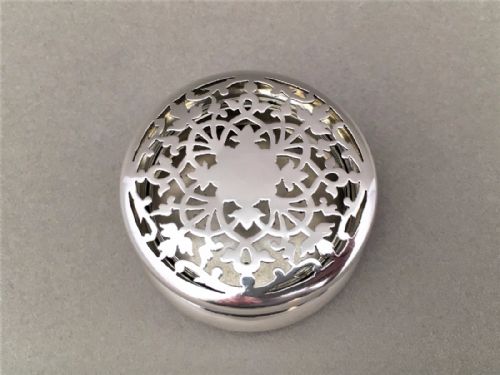 fig 1. A charming pierced silver pot pourri pot.