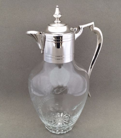 A Stunning Late Victorian Bird Engraved Silver Plated Claret Jug.