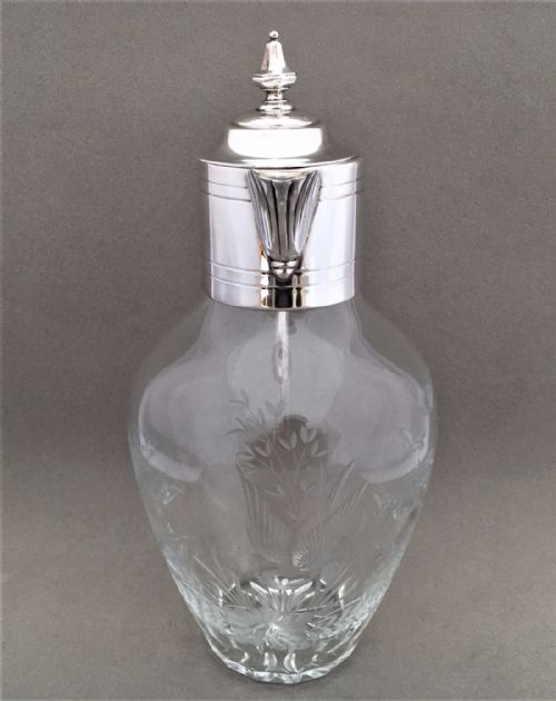 fig 1. A Stunning late Victorian bird engraved silver plated claret jug.