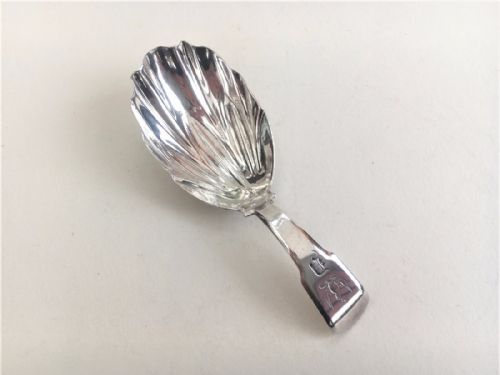 A Georgian Silver Caddy Spoon.