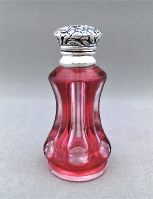 A Cranberry Cut Through Silver Mounted Victorian Scent Bottle.