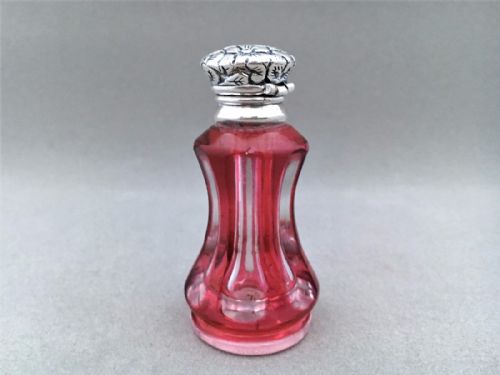fig 1. A cranberry cut through silver mounted Victorian scent bottle.