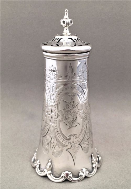 A Stunning Mid Victorian Silver Sugar Caster.