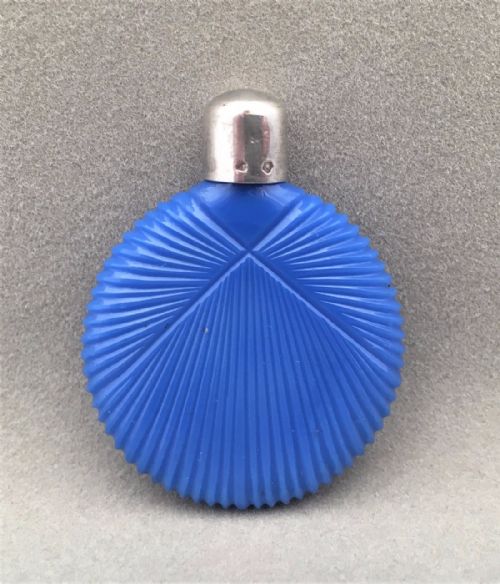 fig 1. A French Silver mounted coin shaped scent bottle.