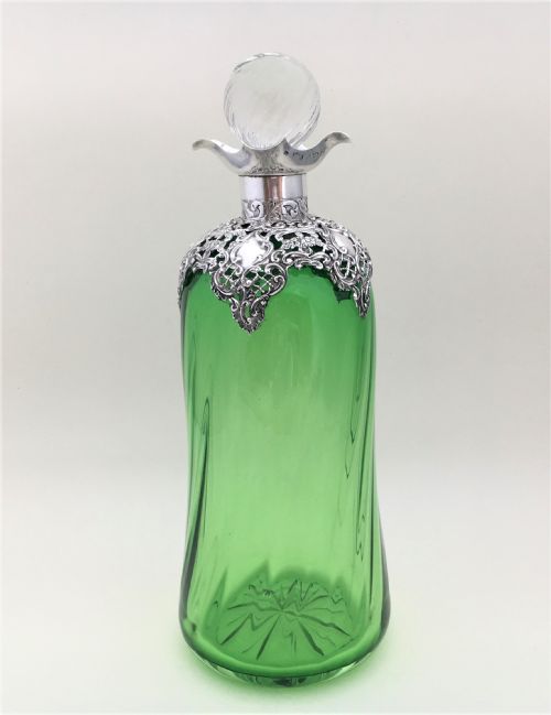 fig 1. A magnificent Edwardian Silver mounted decanter.
