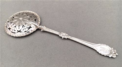fig 1. A rare John Figg Victorian silver sifter spoon.