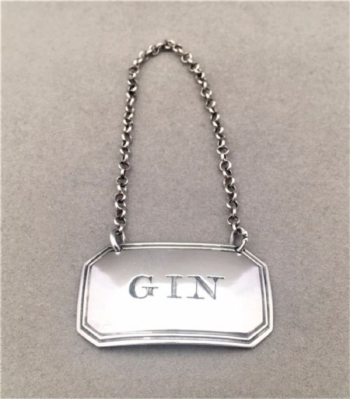 fig 1. A Georgian silver Gin label.