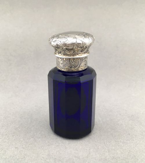 An Unusual Victorian Silver Mounted Scent Bottle