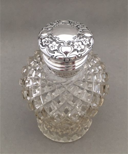 fig 1. A gorgeous Edwardian silver mounted cologne bottle