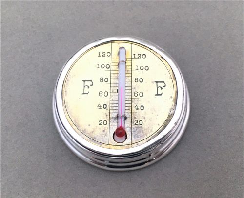 fig 1. A rare and unusual silver desk thermometer and paperweight
