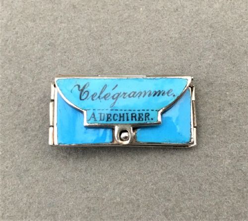 A Delightful Miniature French Silver and Enamel Sweetheart Charm