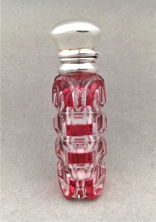 fig 1. A Victorian silver mounted cranberry scent bottle