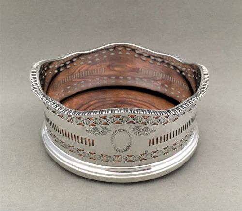 An Excellent George V Pierced Silver Wine Bottle Coaster
