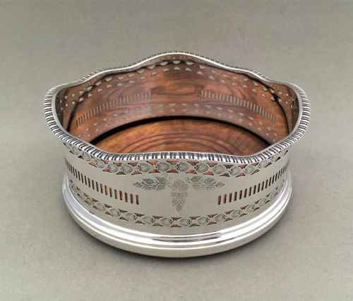 fig 1. An excellent George V pierced silver wine bottle coaster