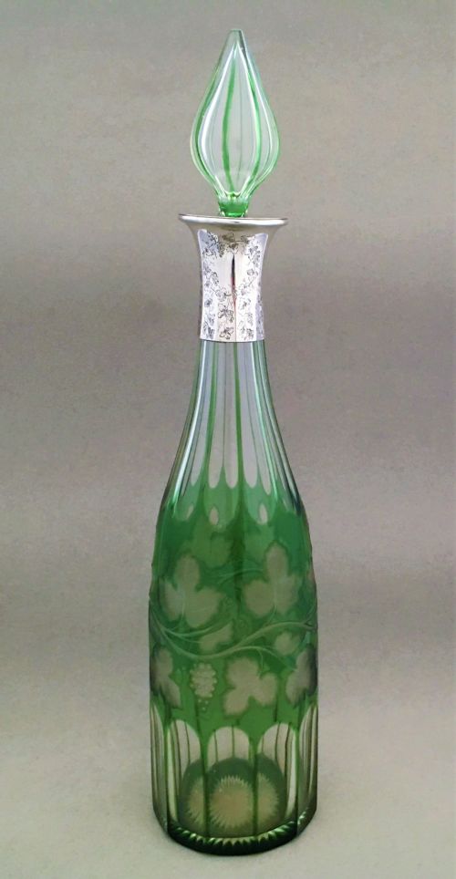 A Stunning Silver Mounted Fruiting Vine Decanter