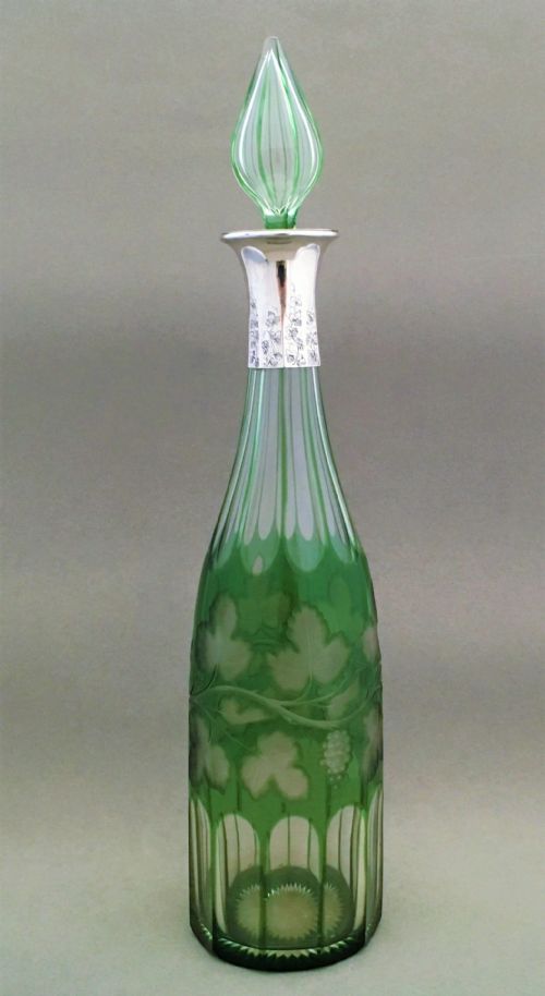 fig 1. A stunning silver mounted fruiting vine decanter