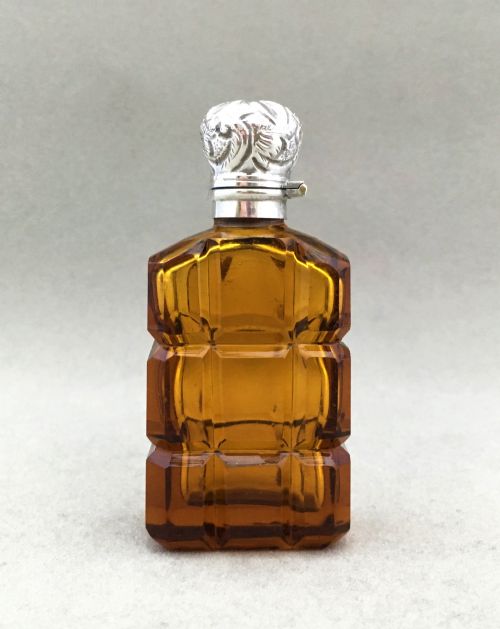 An Amber Silver Mounted Victorian Scent Bottle