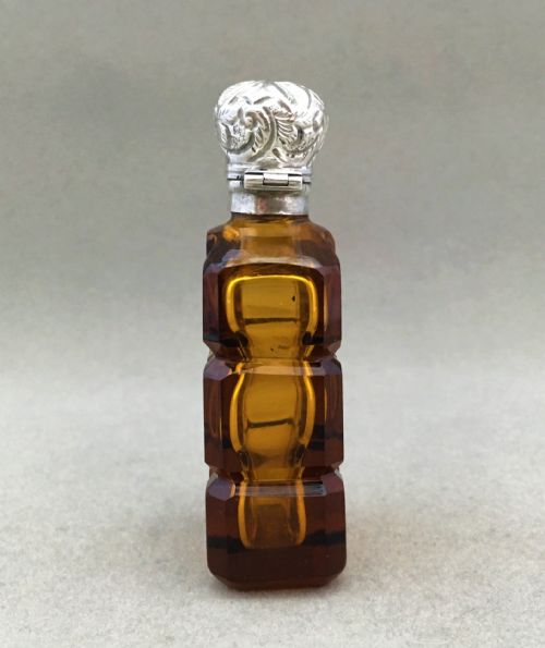 fig 1. An amber silver mounted Victorian scent bottle