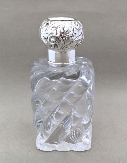 A Wonderful Edwardian Silver Mounted Cologne Bottle