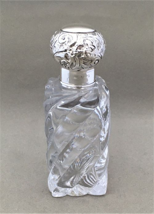 fig 1. A wonderful Edwardian silver mounted cologne bottle