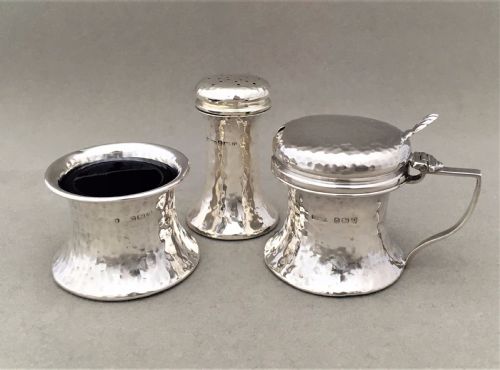 fig 1. A Silver Arts and Crafts three piece cruet